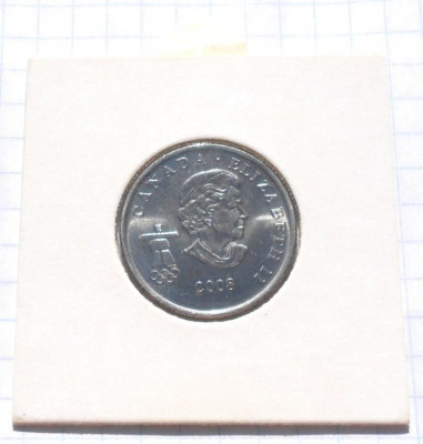 kanada_25_centiv_2008_r_xxi_zimovi_olimpijski_igri_vankuver_2010_r_figurne_katannja (1).jpg